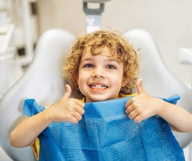 Happy,Cute,Little,Boy,In,Dental,Ofiice,Showing,Thumbs,Up