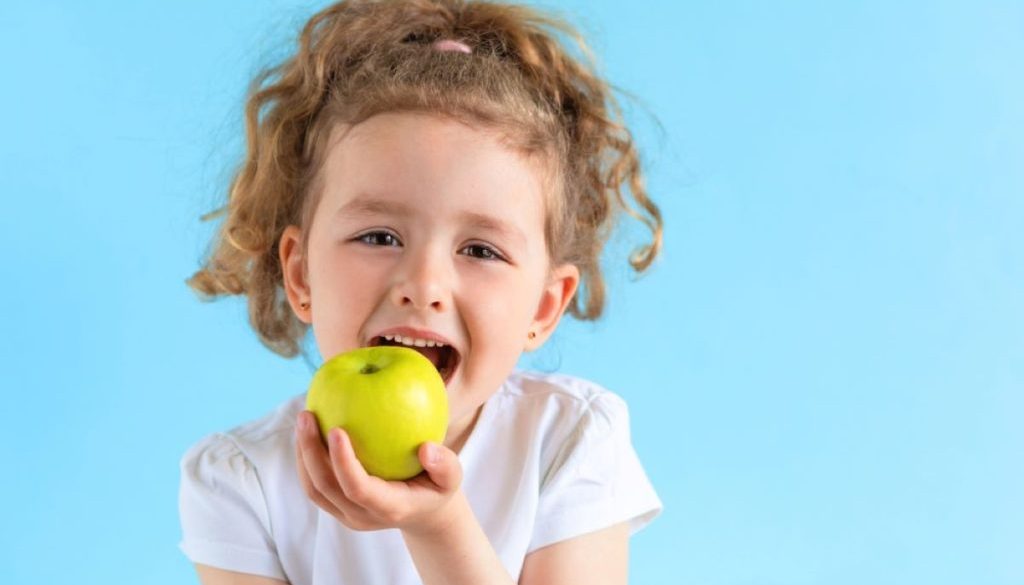 Girl practicing oral nutrition in Reno, Nevada